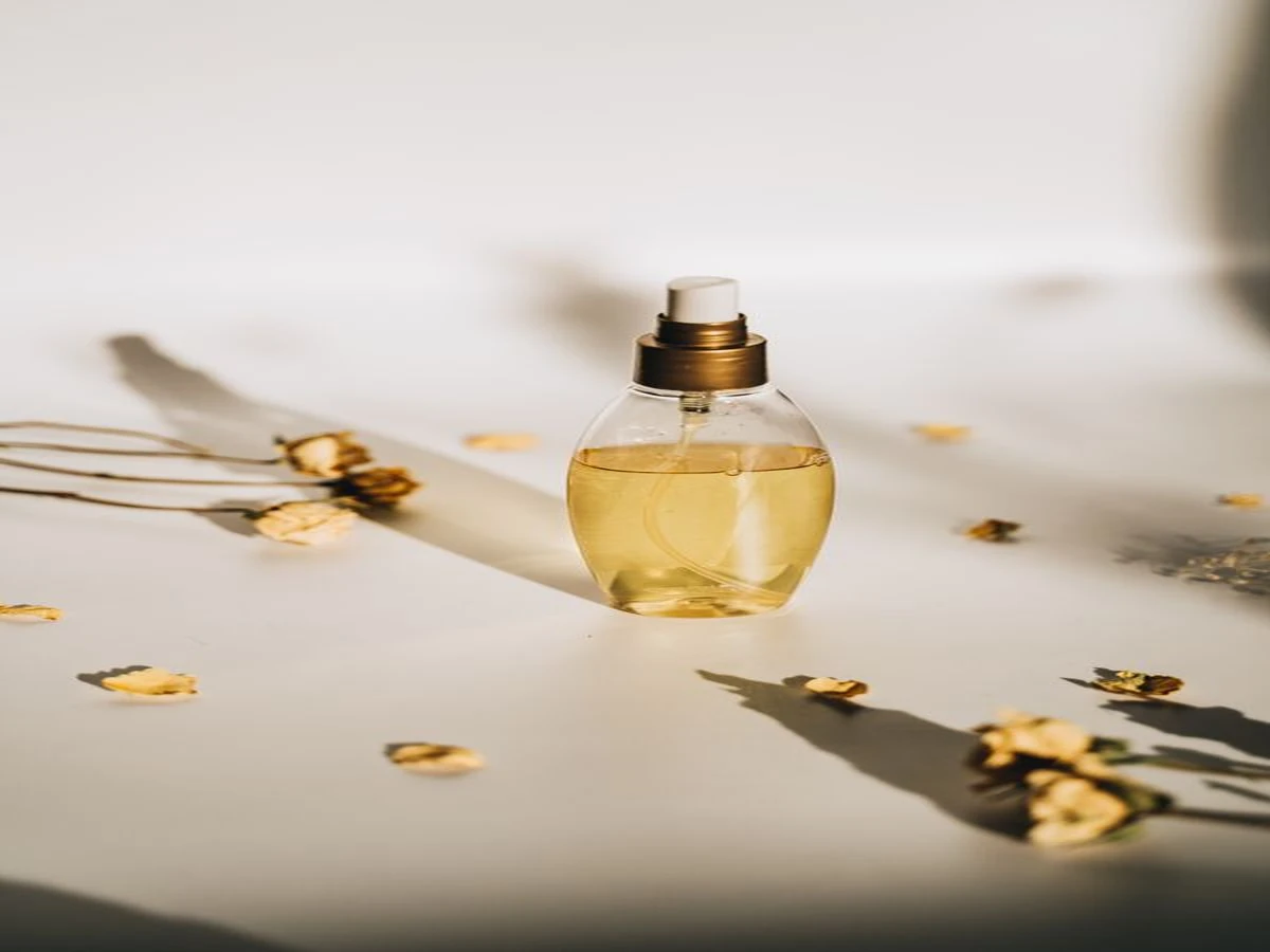 Everygen AI planning context: Perfume bottle and dried flowers as a product composition reference